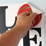 Peel and stick to any smooth wall.