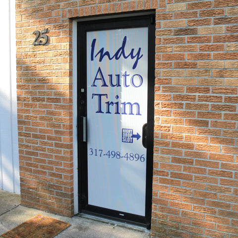Full color perforated window decal on glass door in Indianapolis, Indiana