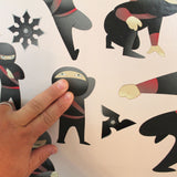 Installation of ninja wall graphics.