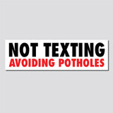 Not Texting, Avoiding Potholes Bumper Sticker, 2.5"h x 8.5"w - 0671, Sticker